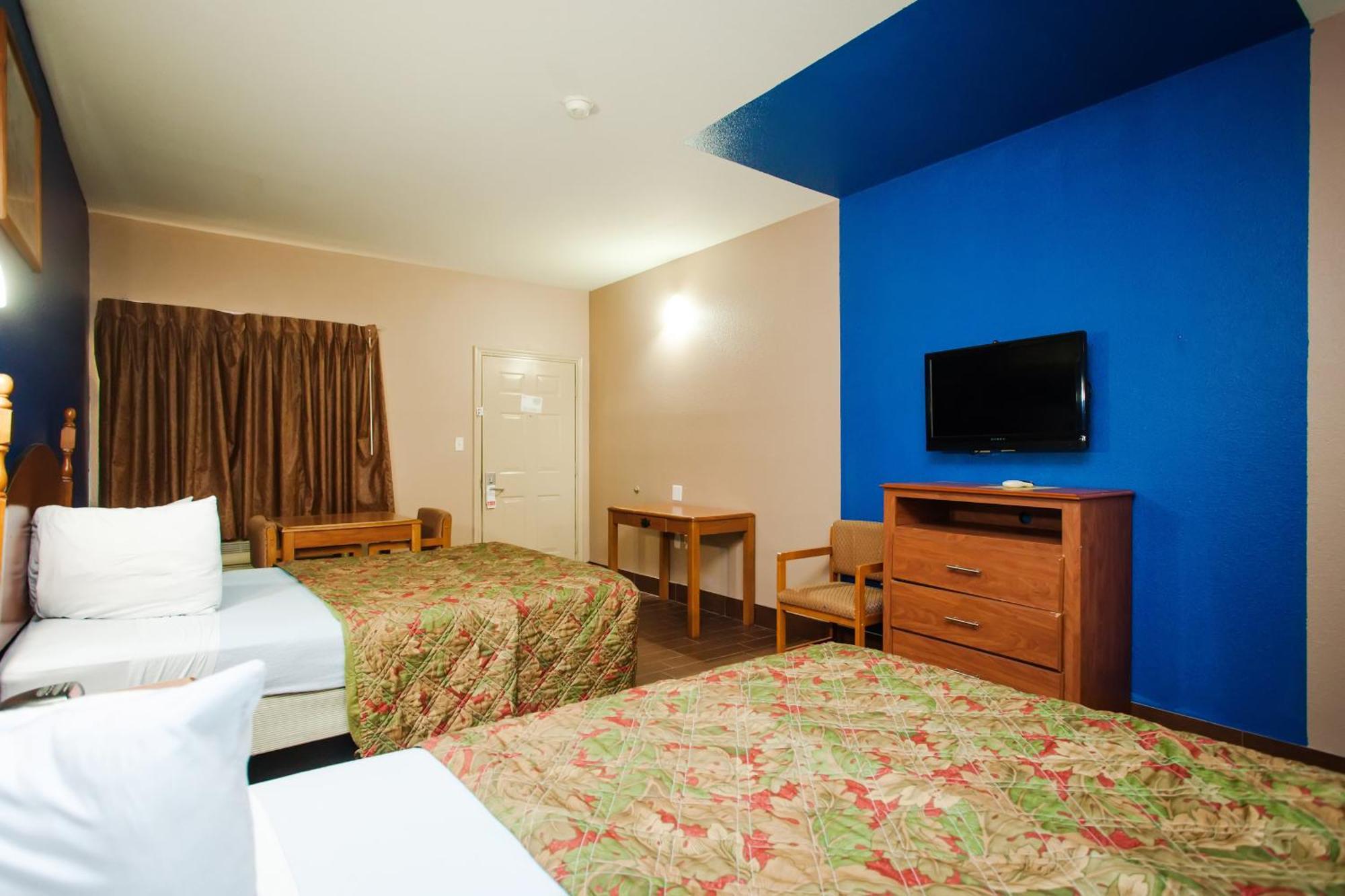 Scottish Inn & Suites Hankamer Bilik gambar