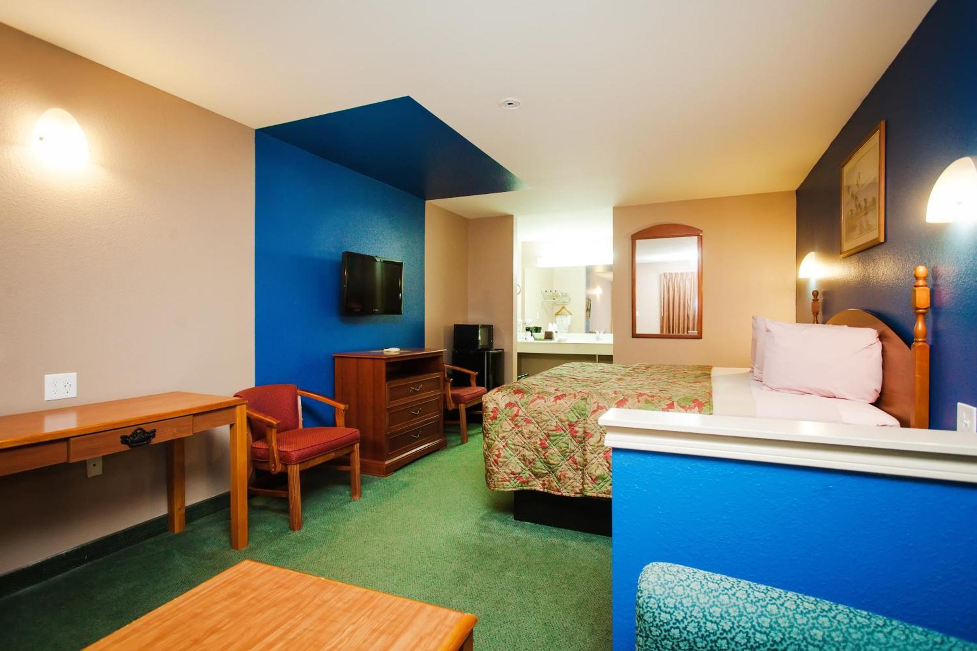 Scottish Inn & Suites Hankamer Bilik gambar