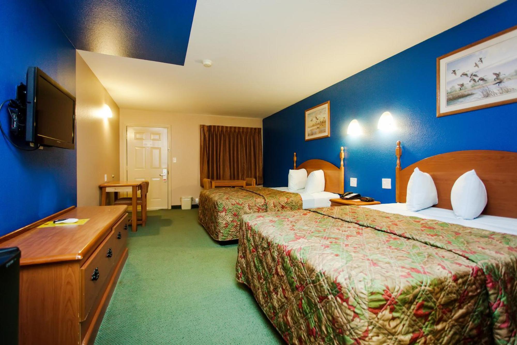 Scottish Inn & Suites Hankamer Bilik gambar